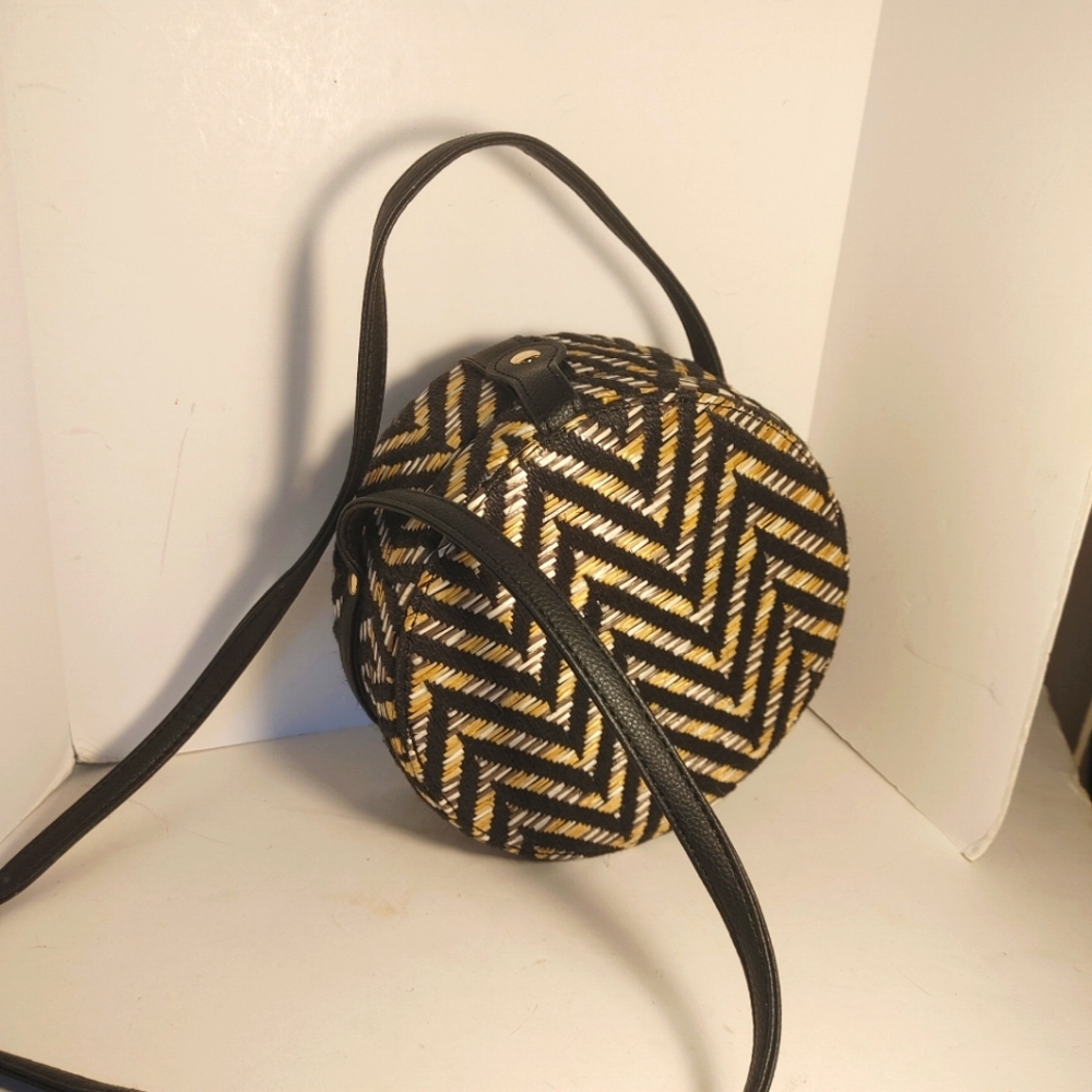 Lionel Circular Cross body Herringbone Handbag Leather strap Chevron